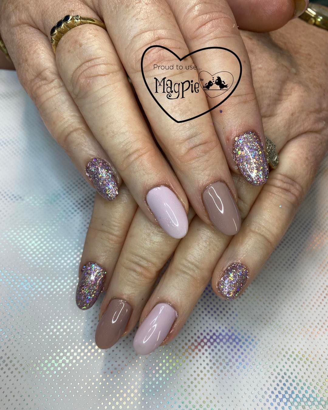 Mauve and glitter almond gel nails